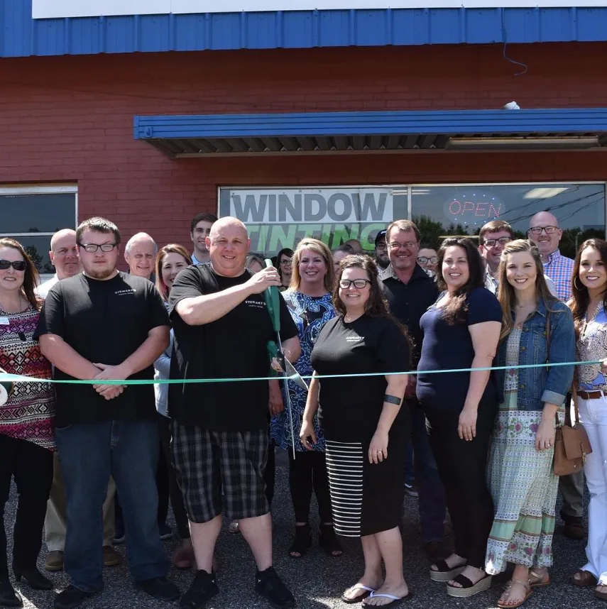 Artint Film team in front of the shop